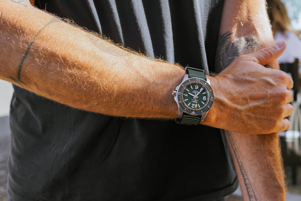 John Moore wearing the Breitling x Outerknown watch